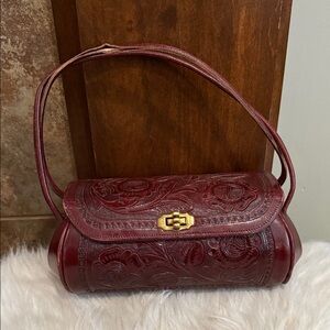 Vintage unique deep red burgundy tooled barrel bag purse twist lock boho western